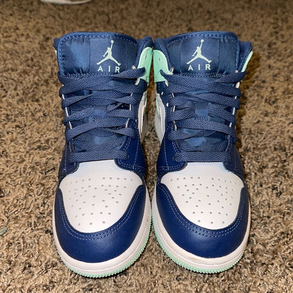 navy blue and teal air jordan’s